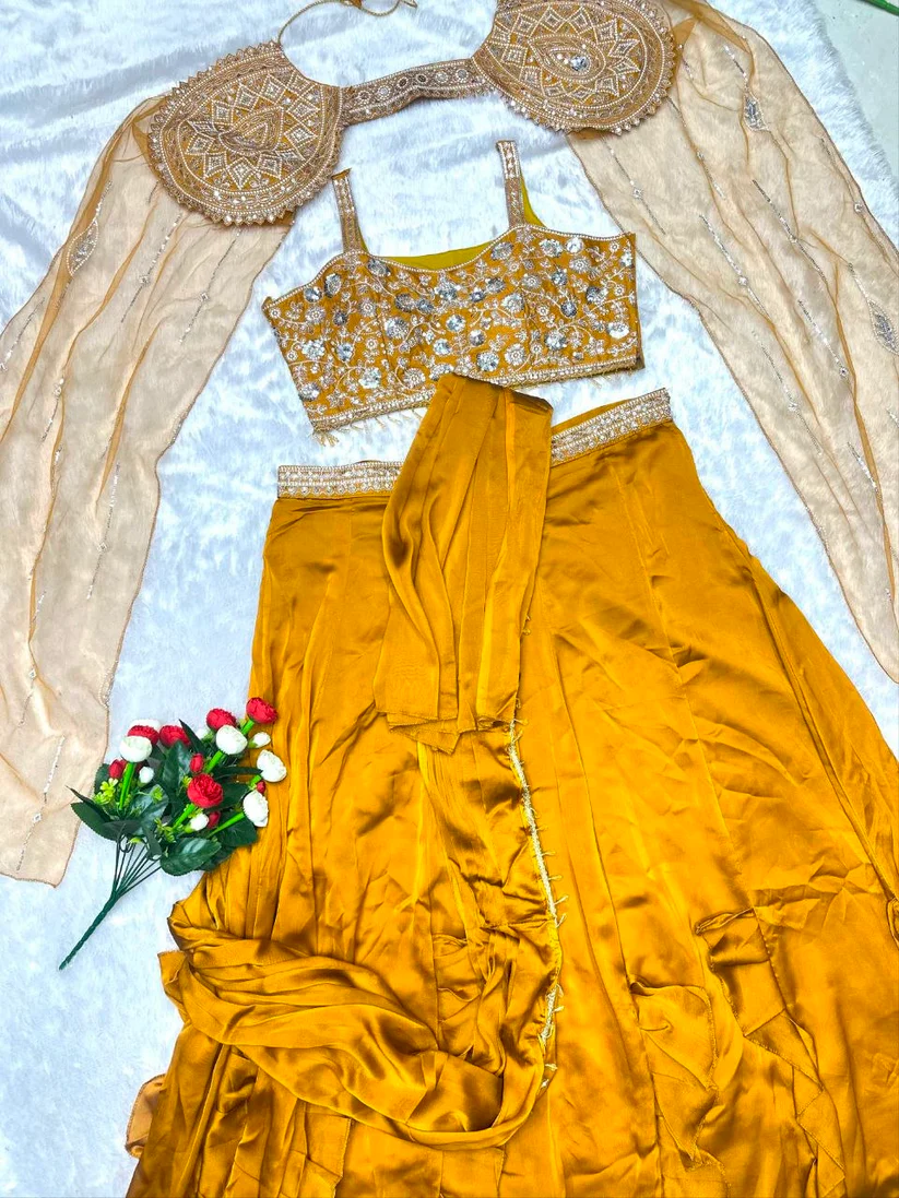 New Superhit Fancy Rangoli Silk Fabric Lehenga Choli in Mustard Color